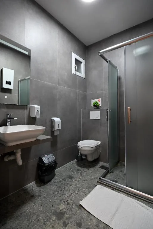 Bathroom with shower and toiletries