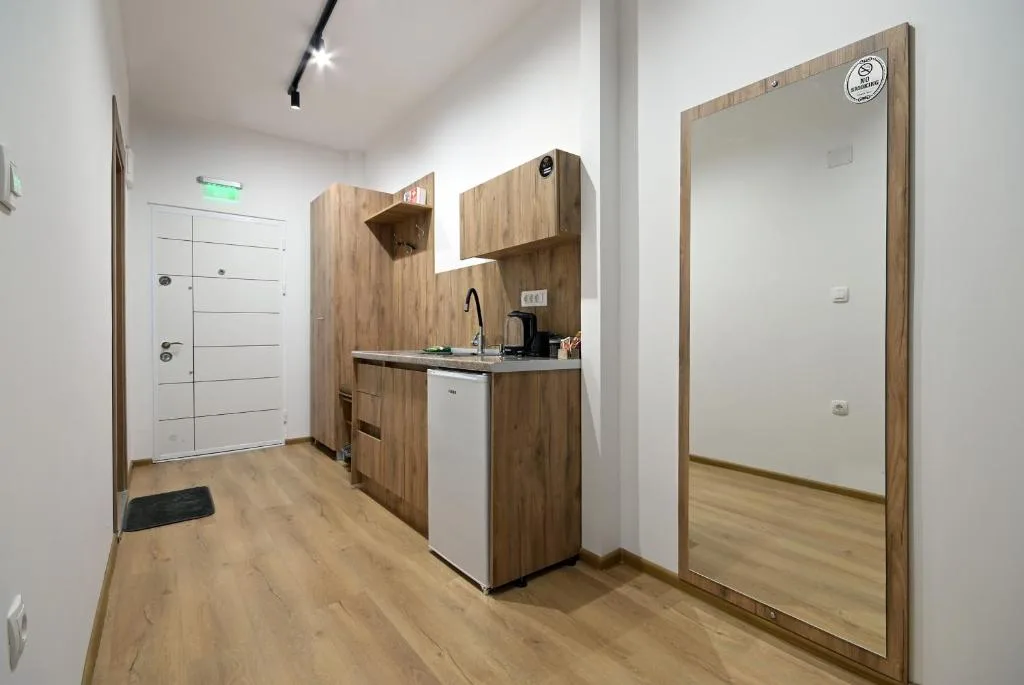 Compact kitchenette with dining table