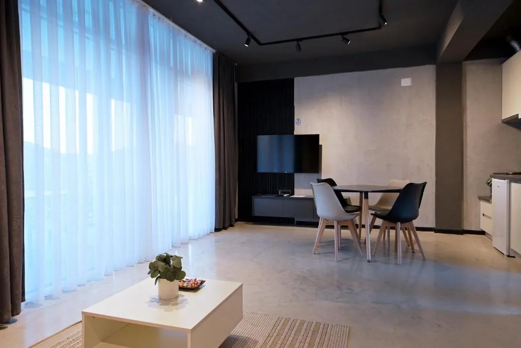 Living and dining area inside a family studio