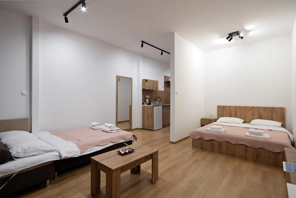 Studio with rose-coloured accents