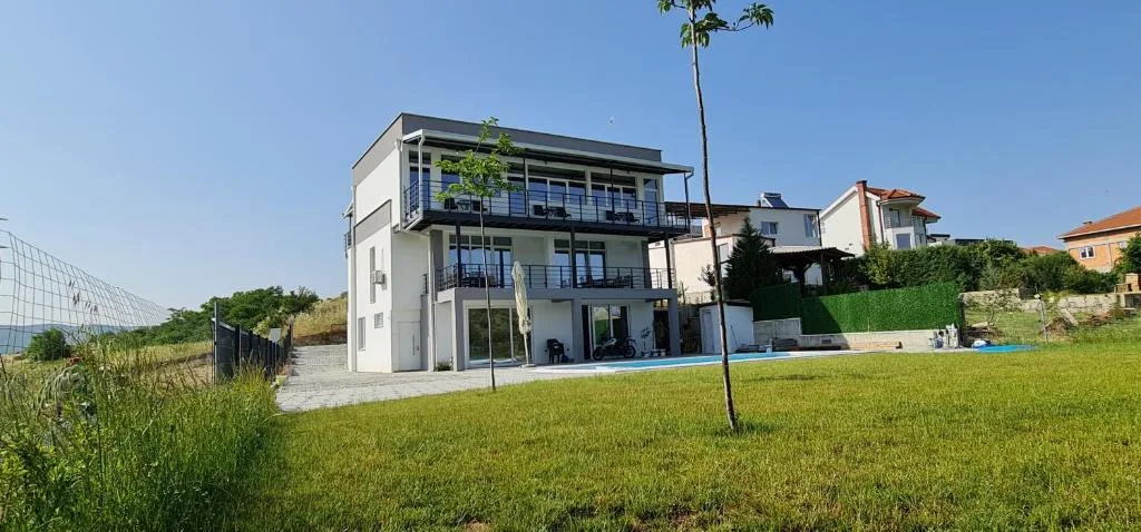 Front view of the apartment building with terraces